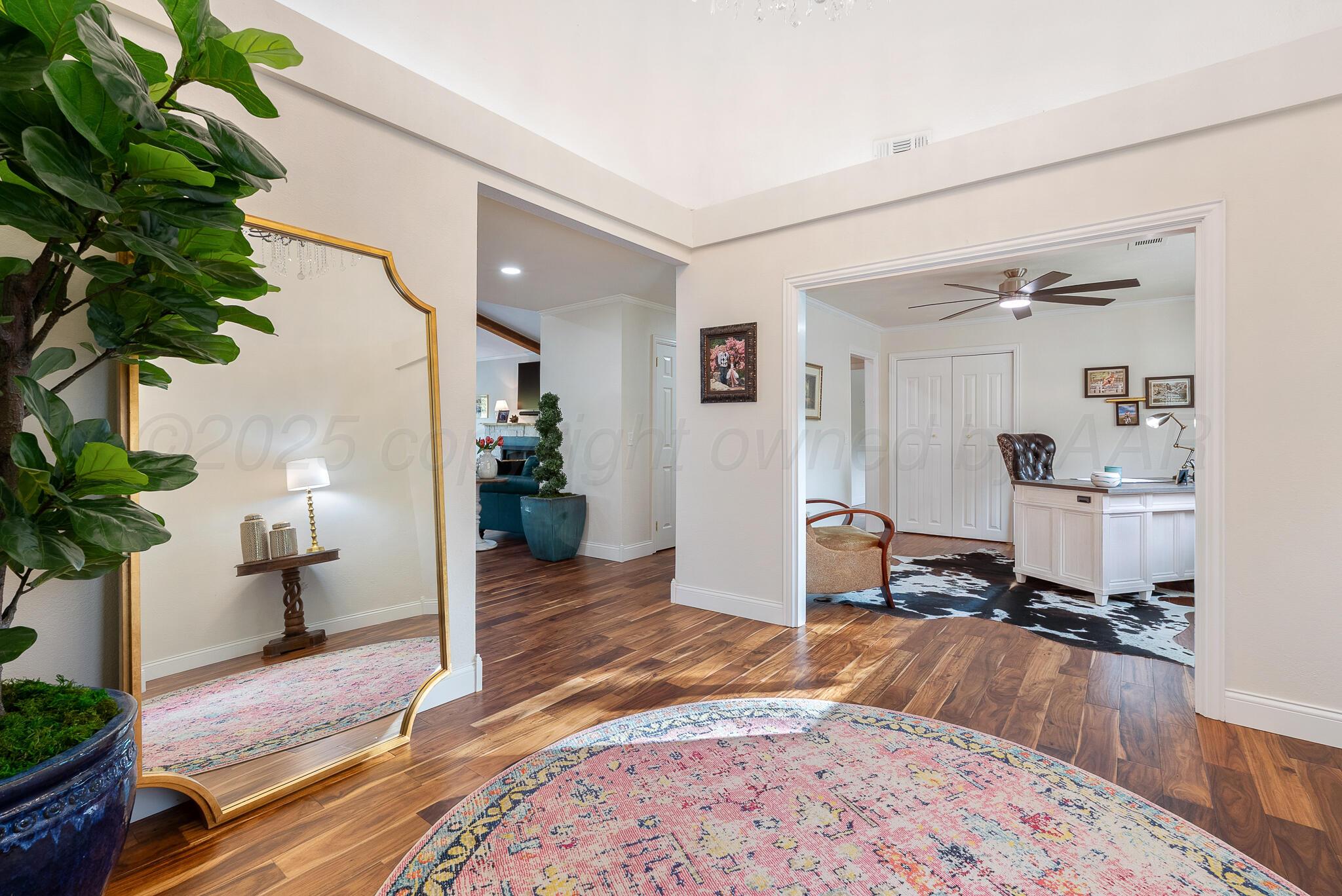 110 Caprock Lane Amarillo, TX 79118 - Photo 5 of 46 a living room with furniture and a potted plant