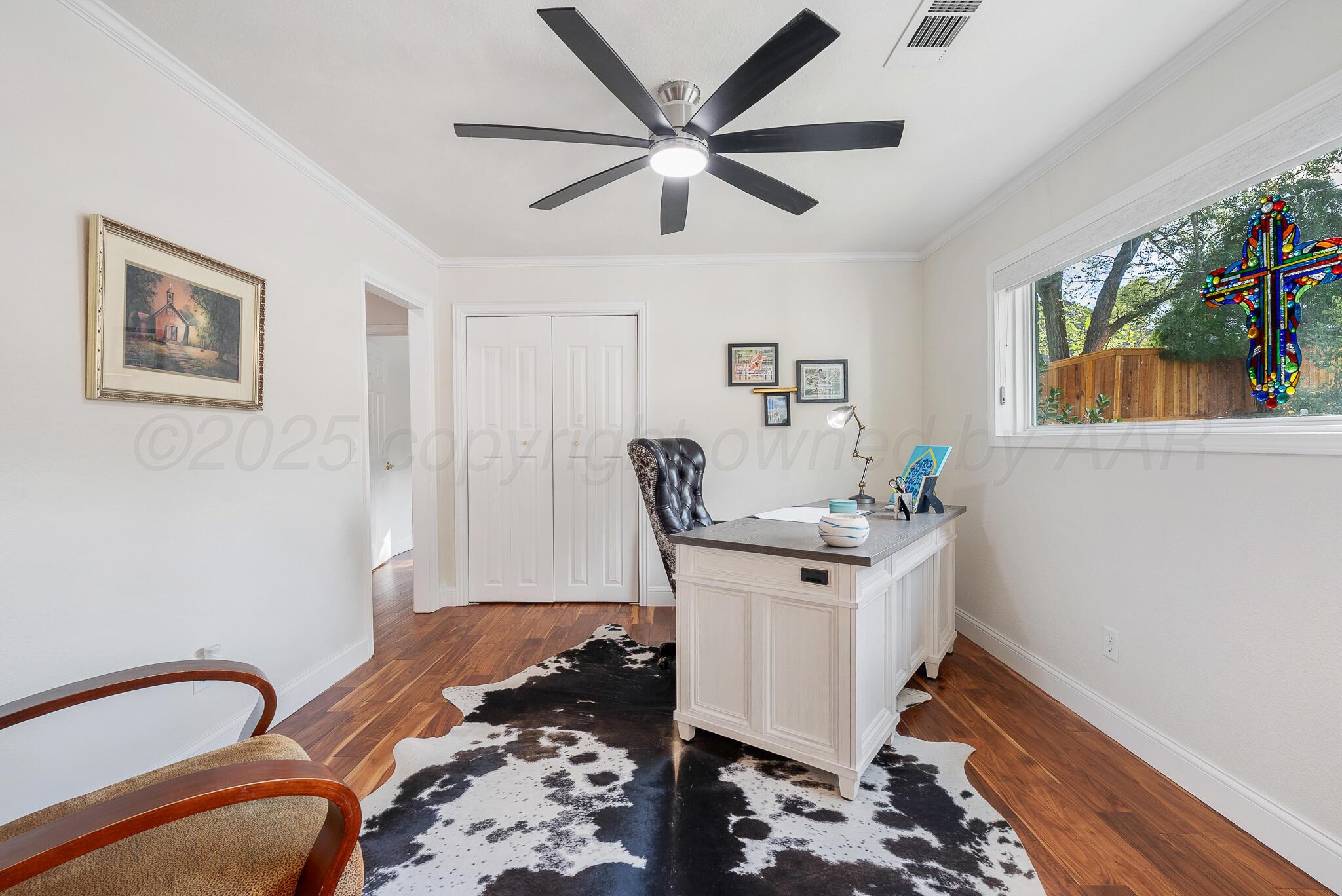 110 Caprock Lane Amarillo, TX 79118 - Photo 6 of 46 a workspace with furniture and window