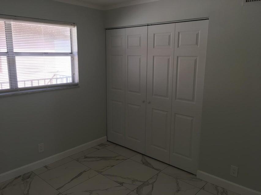 450 Southwest 2nd Avenue, Unit 2080 Boca Raton, FL 33432 - Photo 12 of 14 a small space with a window