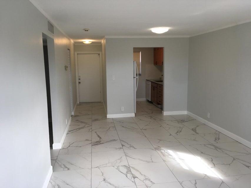 450 Southwest 2nd Avenue, Unit 2080 Boca Raton, FL 33432 - Photo 7 of 14 a view of a hallway
