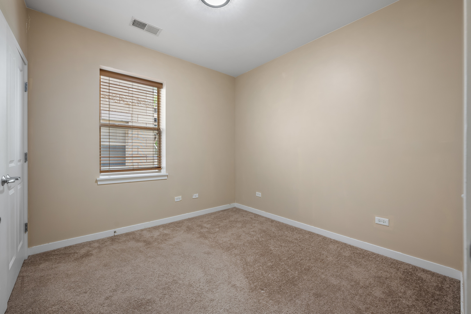 907 South Lytle Street, Unit 201 Chicago, IL 60607 - Photo 11 of 28 an empty room with windows