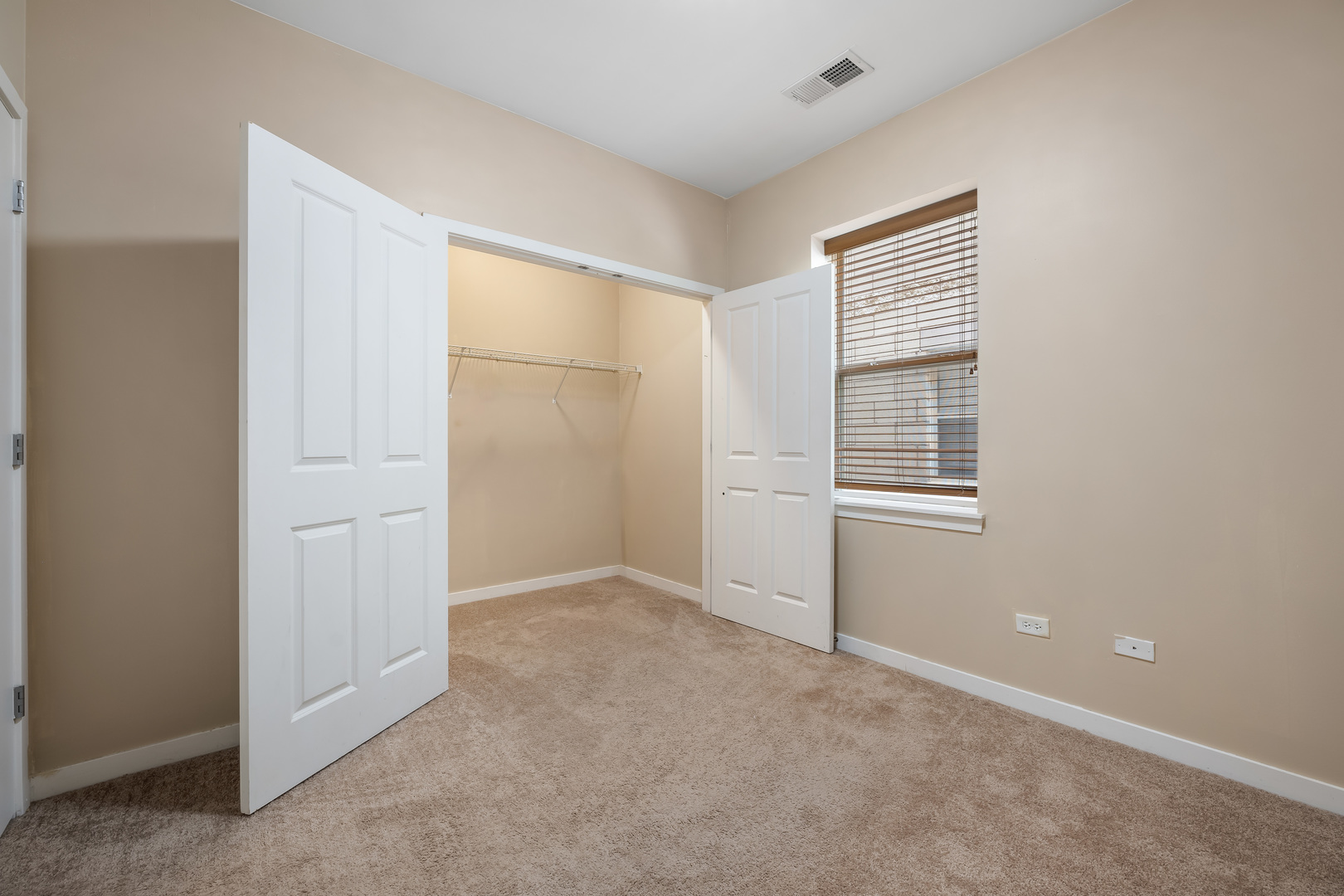907 South Lytle Street, Unit 201 Chicago, IL 60607 - Photo 12 of 28 an empty room with windows