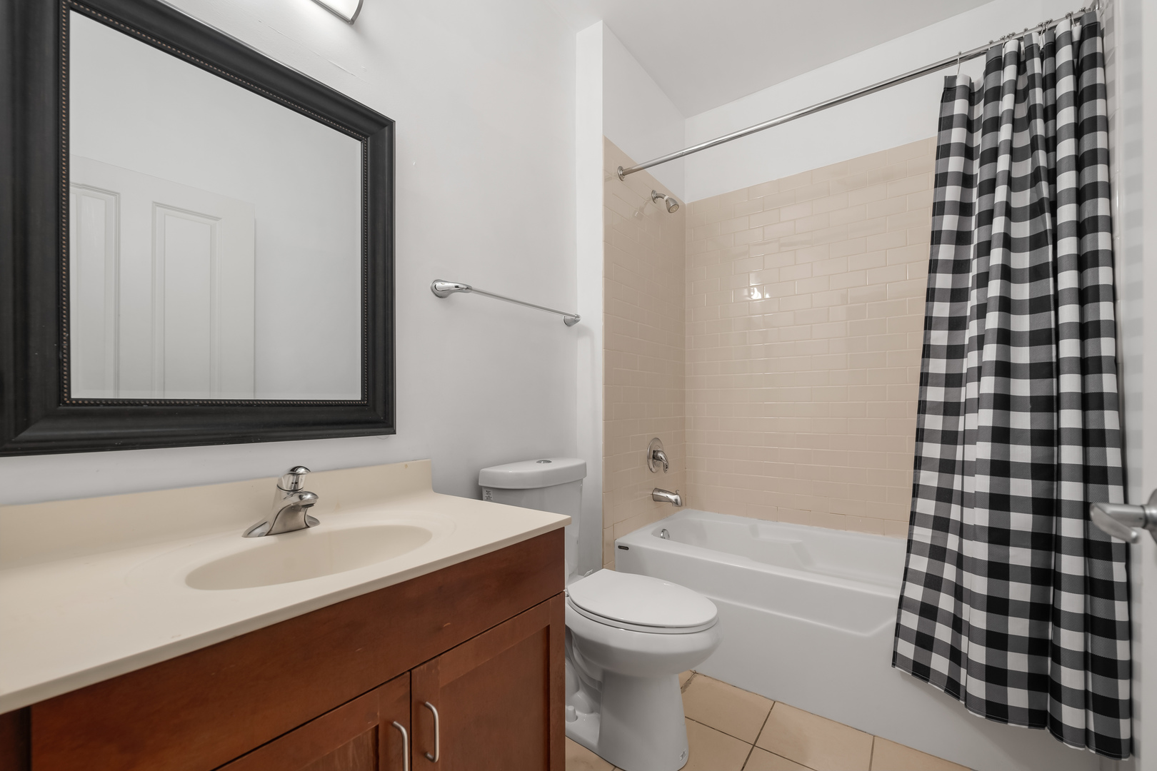 907 South Lytle Street, Unit 201 Chicago, IL 60607 - Photo 13 of 28 a bathroom with a sink a toilet a mirror and shower