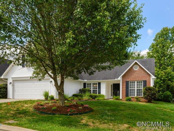25 Forest Berry Road Fletcher, NC 28732 - Photo 1 of 24 a front view of a house with a garden