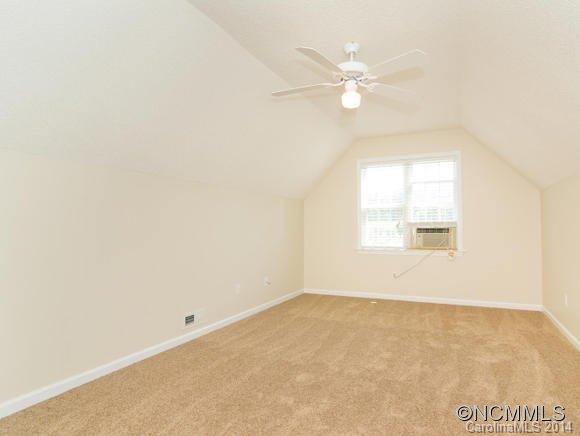25 Forest Berry Road Fletcher, NC 28732 - Photo 23 of 24 an empty room with a window and a ceiling fan