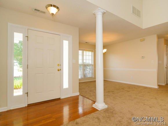 25 Forest Berry Road Fletcher, NC 28732 - Photo 5 of 24 a view of an empty room with window and wooden floor
