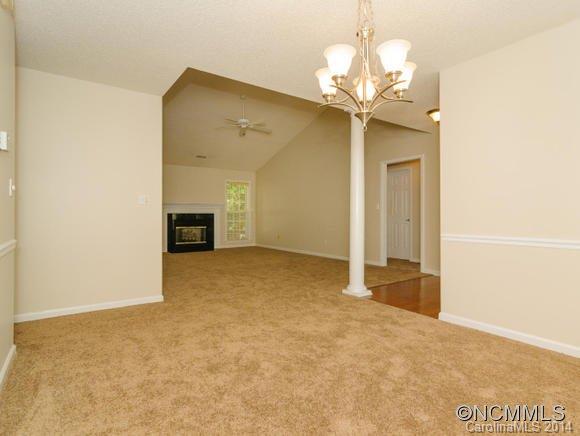 25 Forest Berry Road Fletcher, NC 28732 - Photo 7 of 24 a view of a livingroom with a chandelier