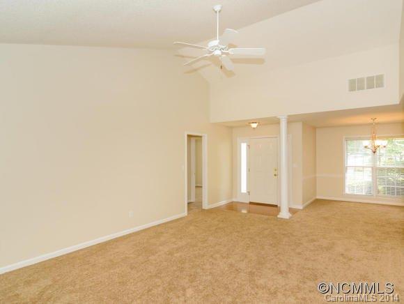 25 Forest Berry Road Fletcher, NC 28732 - Photo 10 of 24 an empty room with fan and windows