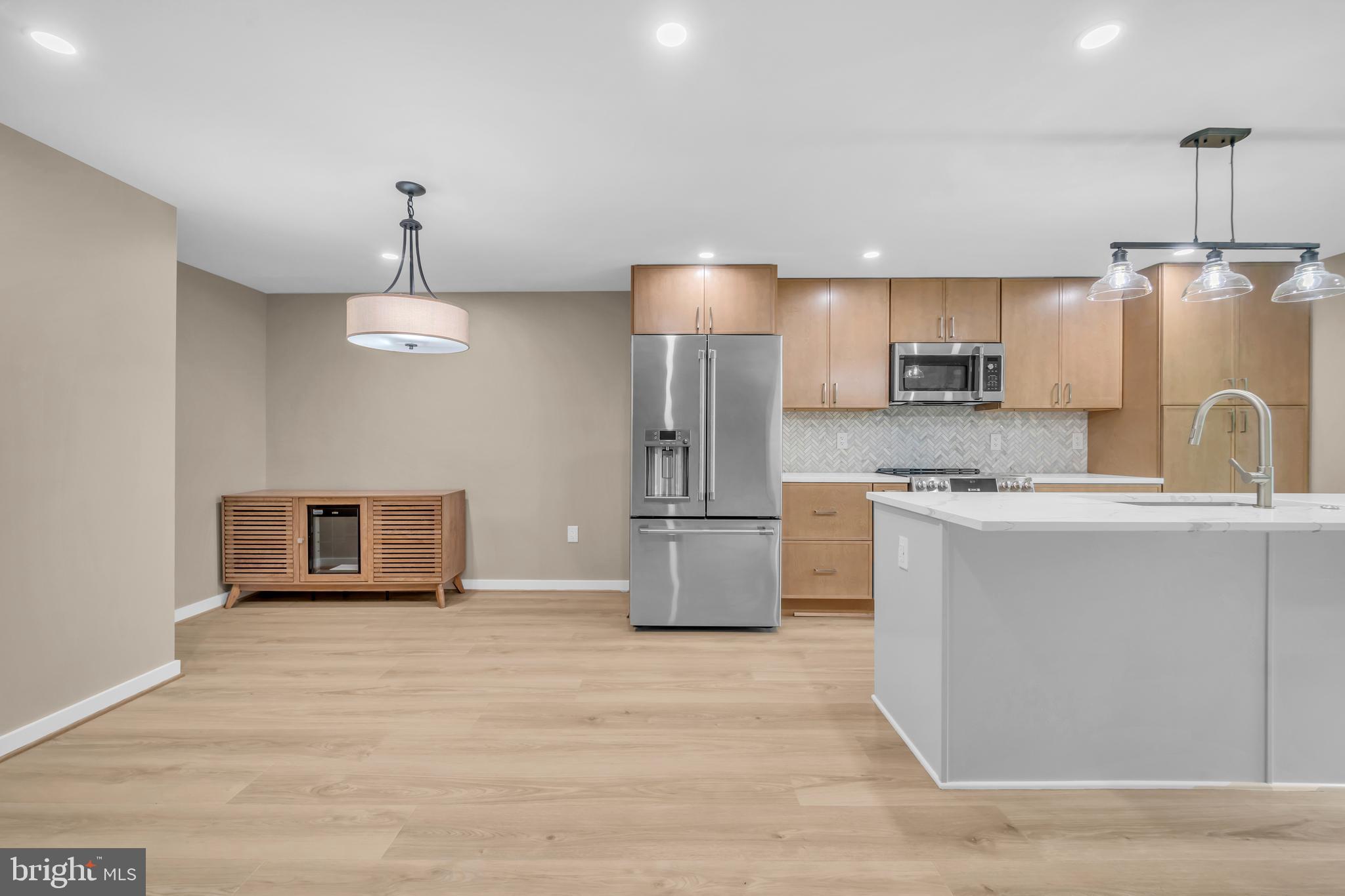 1806 North Shore Court Reston, VA 20190 - Photo 5 of 58 View from living room into kitchen area