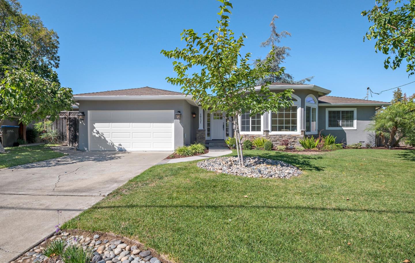 16131 Jacaranda Way Los Gatos, CA 95032 - Photo 2 of 30 a front view of a house with a garden