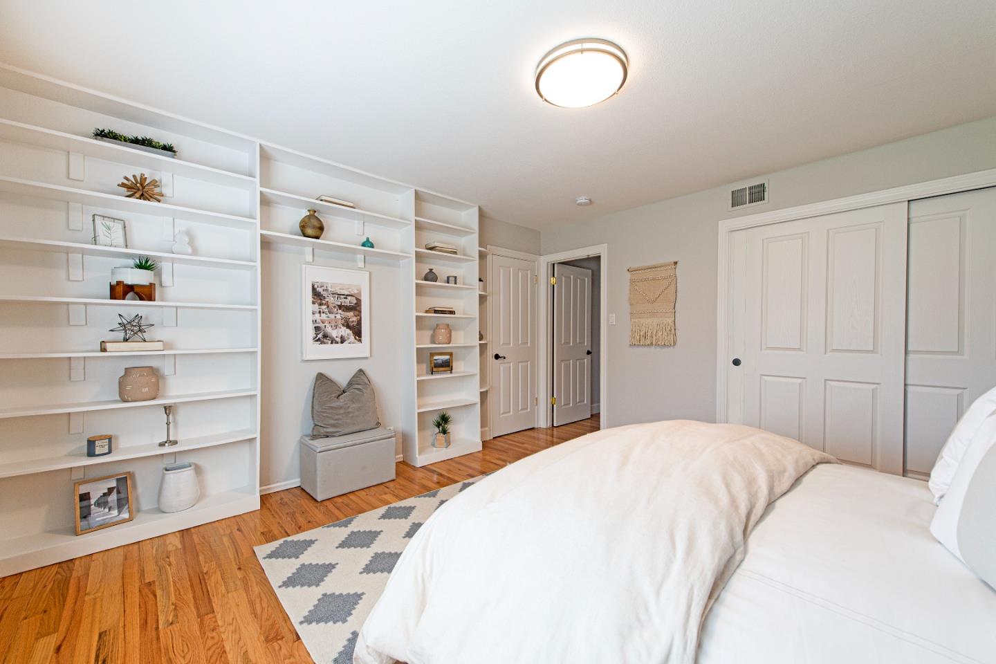 16131 Jacaranda Way Los Gatos, CA 95032 - Photo 17 of 30 a bedroom with a bed and closet