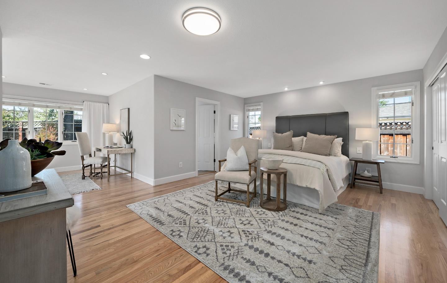 16131 Jacaranda Way Los Gatos, CA 95032 - Photo 23 of 30 a bedroom with a bed and wooden floor