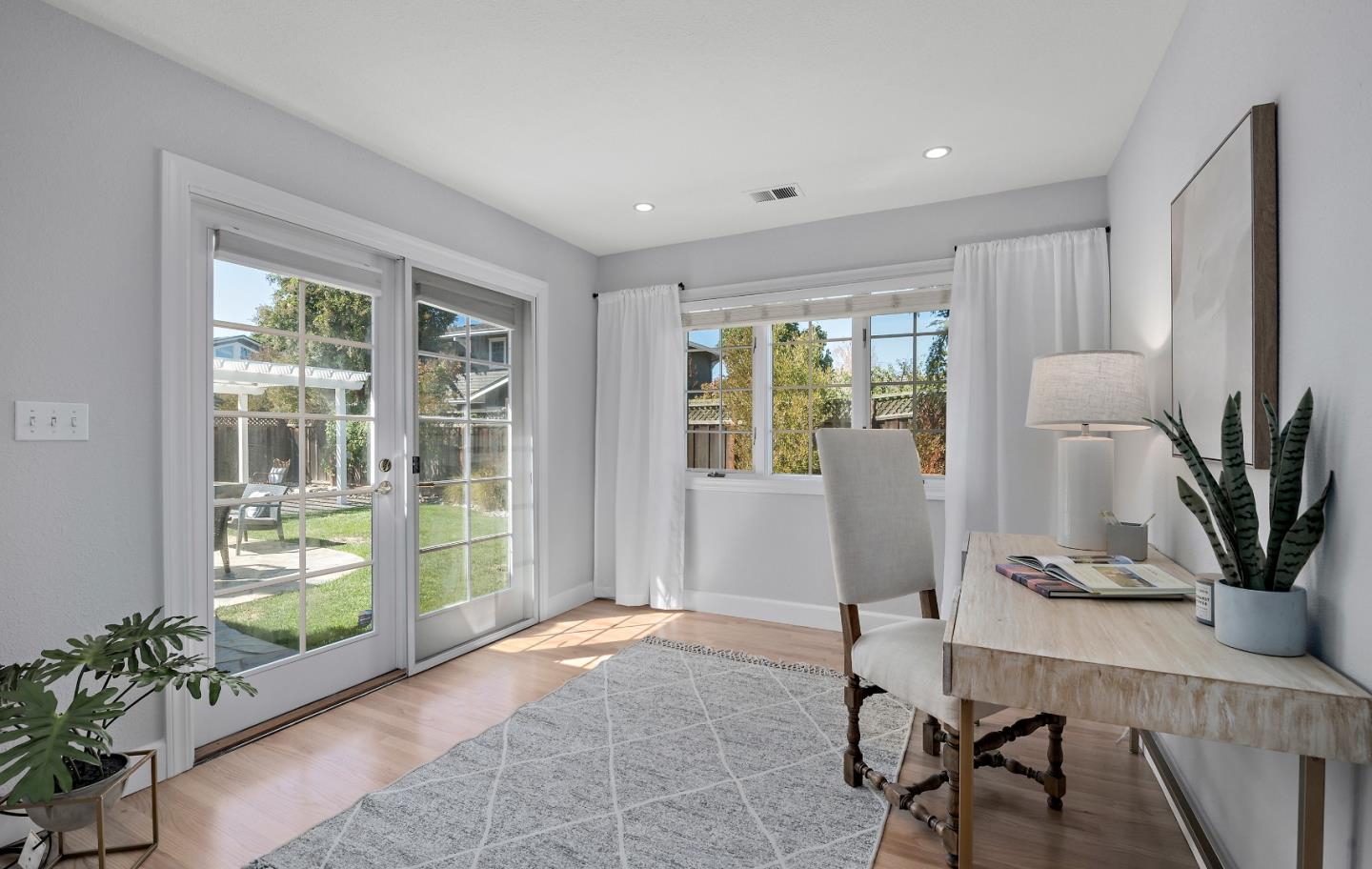 16131 Jacaranda Way Los Gatos, CA 95032 - Photo 25 of 30 a living room with furniture and a potted plant