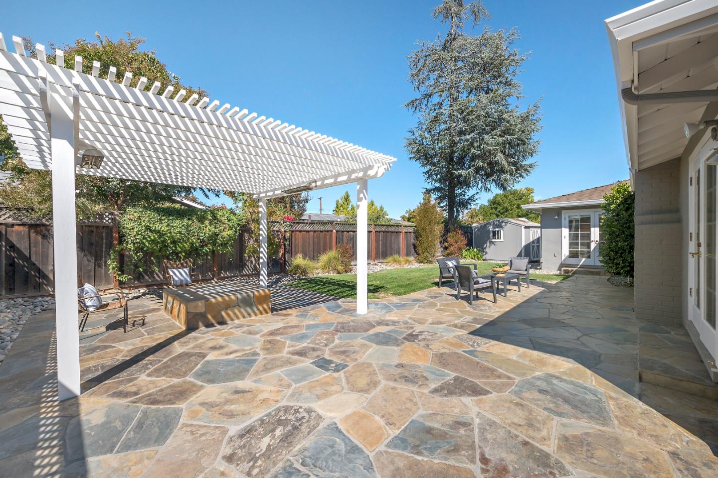 16131 Jacaranda Way Los Gatos, CA 95032 - Photo 28 of 30 a view of a backyard with sitting area