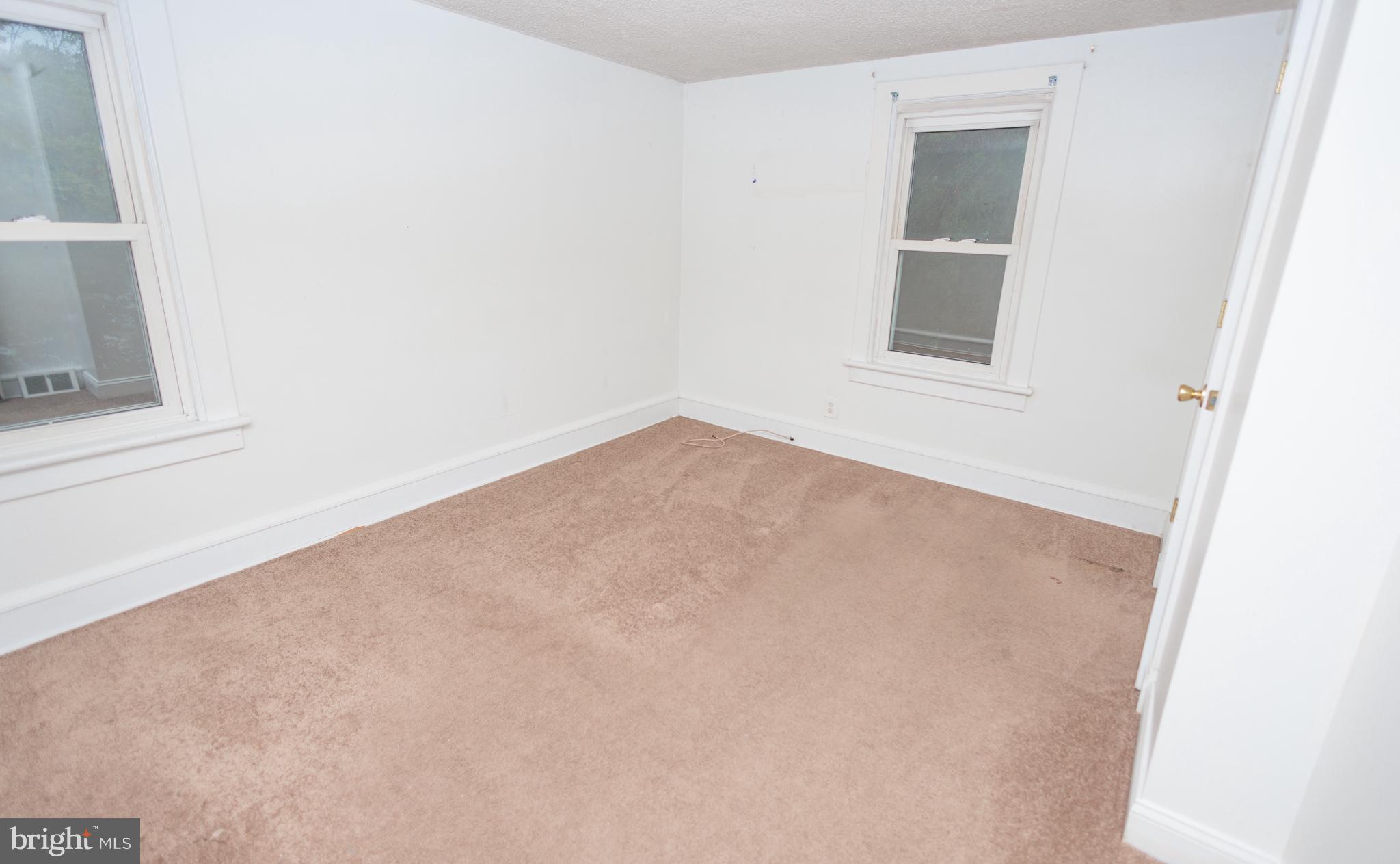130 State Street Glassboro, NJ 08028 - Photo 11 of 17 an empty room with a window