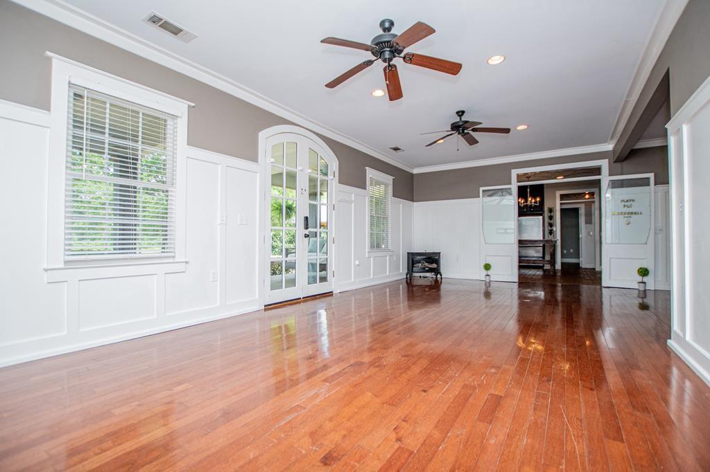75 Cash Lane Bremen, GA 30110 - Photo 22 of 92 a view of empty room with wooden floor and fan
