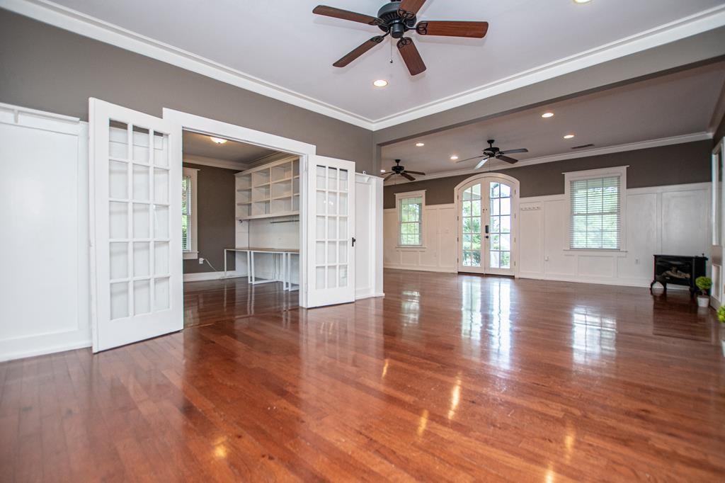 75 Cash Lane Bremen, GA 30110 - Photo 23 of 92 a view of a livingroom with wooden floor and a ceiling fan