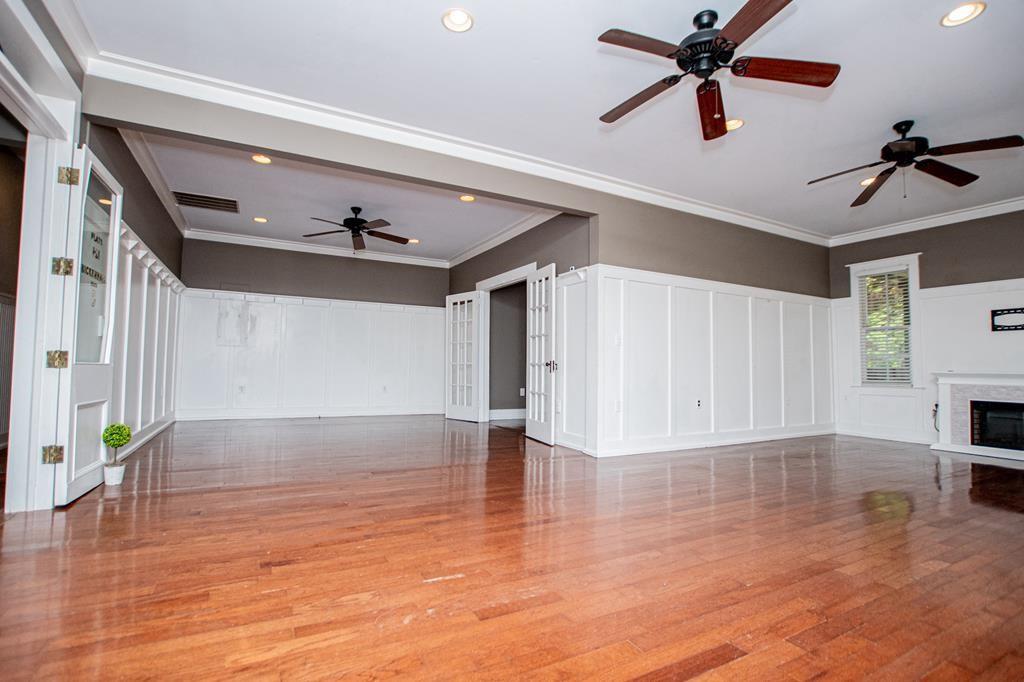 75 Cash Lane Bremen, GA 30110 - Photo 25 of 92 a view of an empty room with a window and wooden floor