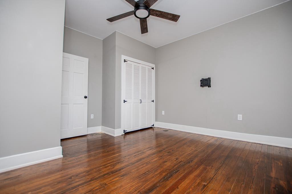 75 Cash Lane Bremen, GA 30110 - Photo 47 of 92 a view of an empty room with window and wooden floor