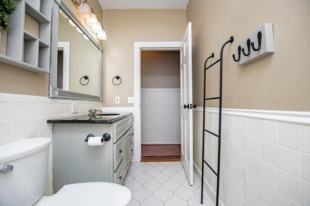 75 Cash Lane Bremen, GA 30110 - Photo 50 of 92 a bathroom with a granite countertop sink toilet and shower