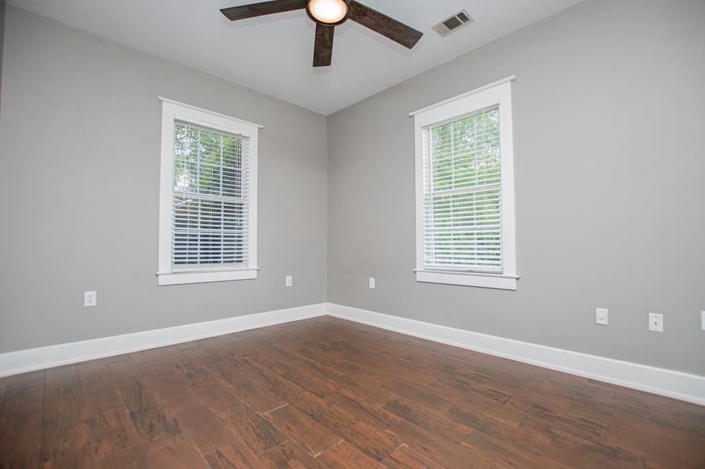 75 Cash Lane Bremen, GA 30110 - Photo 55 of 92 a view of an empty room with wooden floor and a window