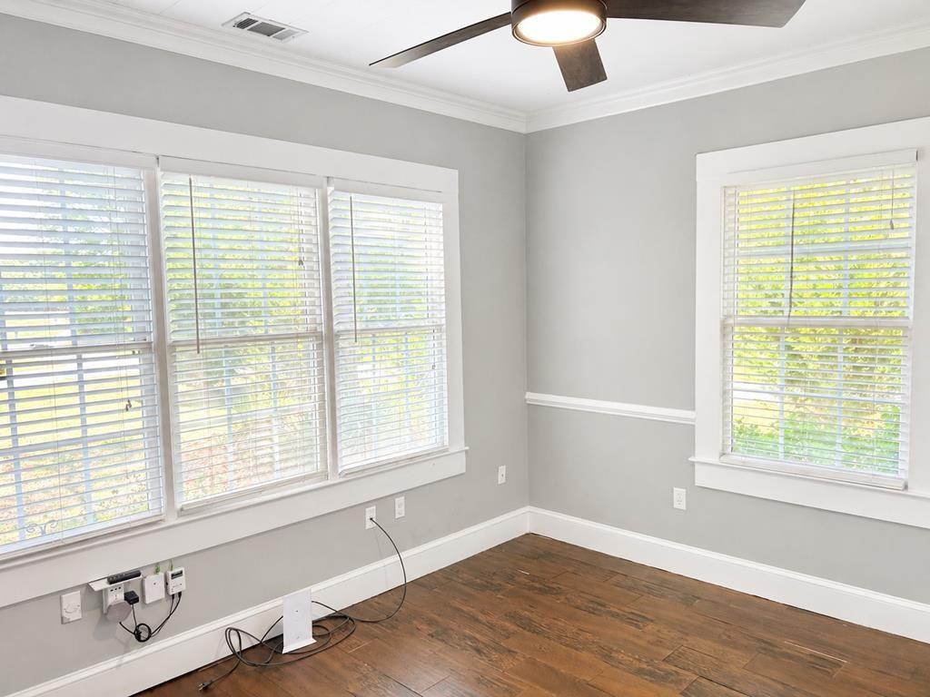 75 Cash Lane Bremen, GA 30110 - Photo 61 of 92 a view of an empty room with a window and wooden floor