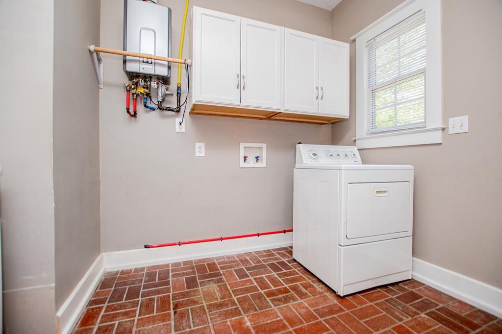 75 Cash Lane Bremen, GA 30110 - Photo 64 of 92 a view of a storage & utility room with washer and dryer