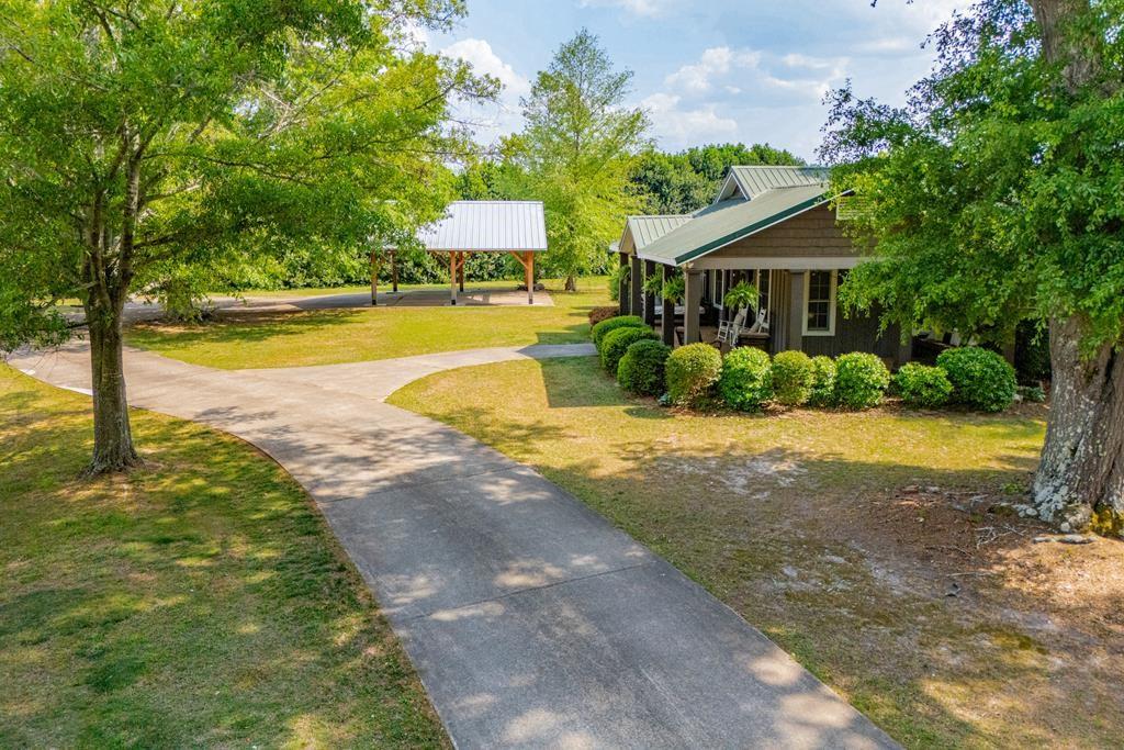 75 Cash Lane Bremen, GA 30110 - Photo 78 of 92 a view of a house with swimming pool and a yard