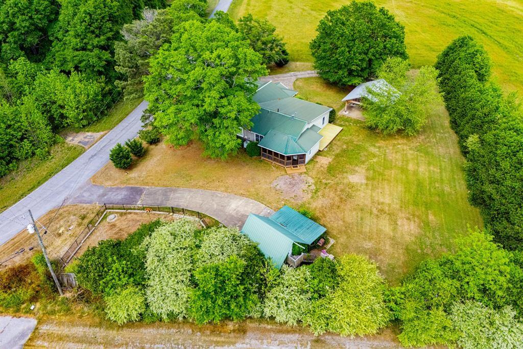 75 Cash Lane Bremen, GA 30110 - Photo 91 of 92 an aerial view of a house with a yard and lake view