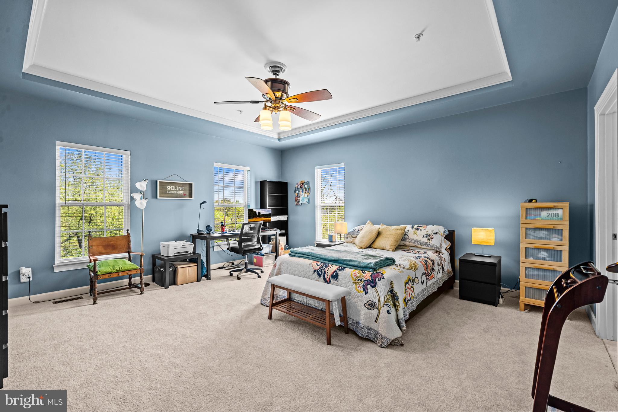 5725 Callcott Way, Unit P Alexandria, VA 22312 - Photo 25 of 40 a bedroom with a bed a desk and chair