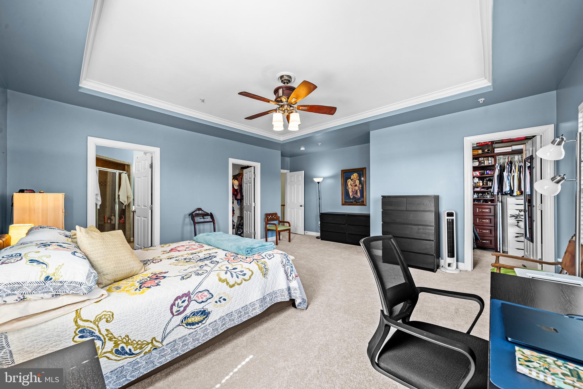 5725 Callcott Way, Unit P Alexandria, VA 22312 - Photo 27 of 40 a bedroom with bed and a chair