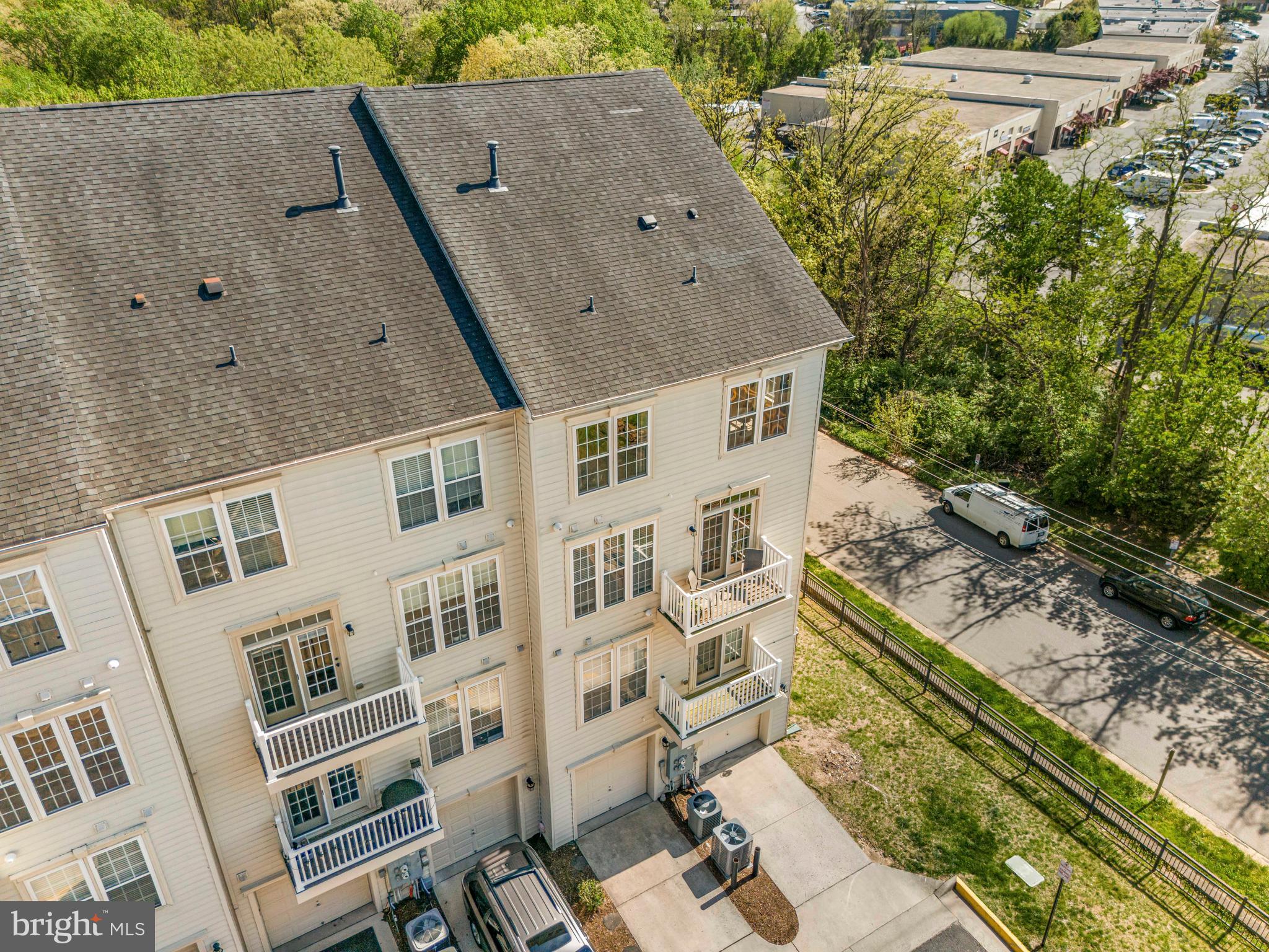 5725 Callcott Way, Unit P Alexandria, VA 22312 - Photo 38 of 40 a aerial view of multiple houses with a yard