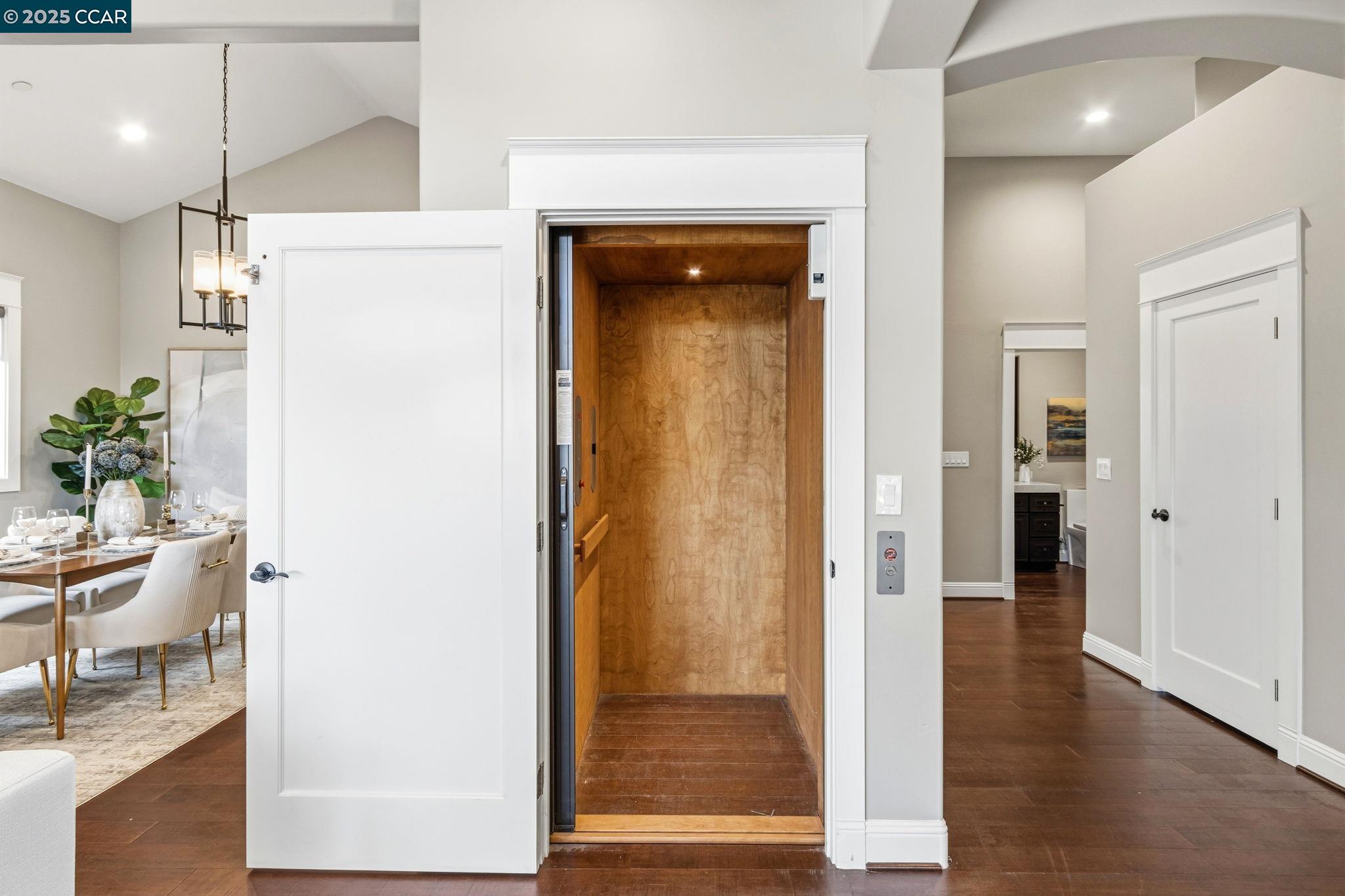 961 Oak View Circle Lafayette, CA 94549 - Photo 14 of 56 a view of a hallway with wooden floor windows and a bathroom