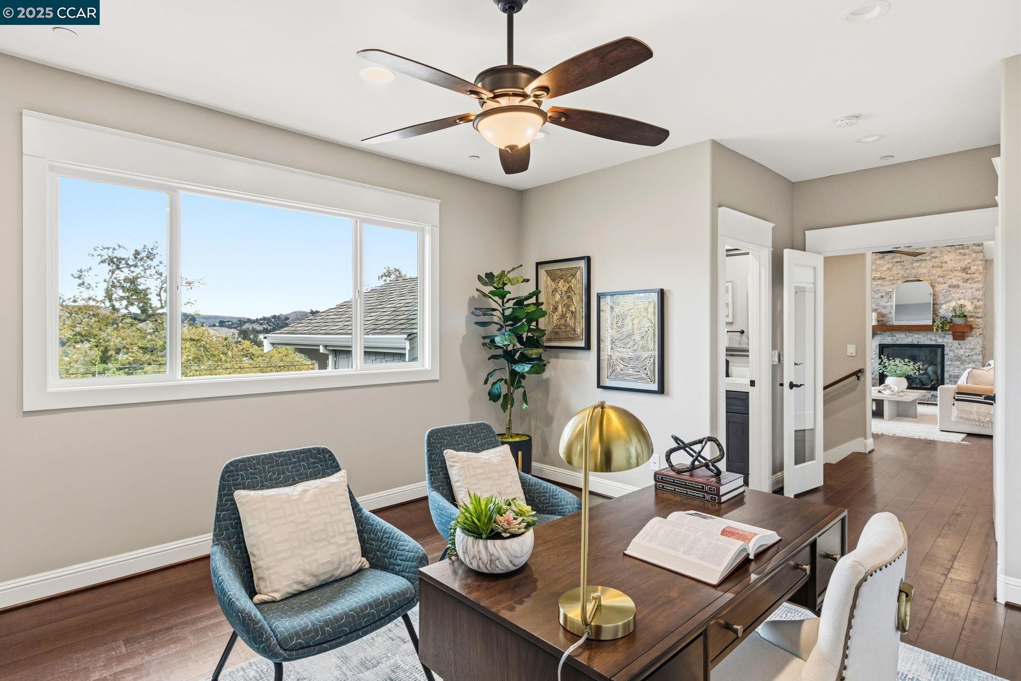 961 Oak View Circle Lafayette, CA 94549 - Photo 17 of 56 a living room with furniture and a large window