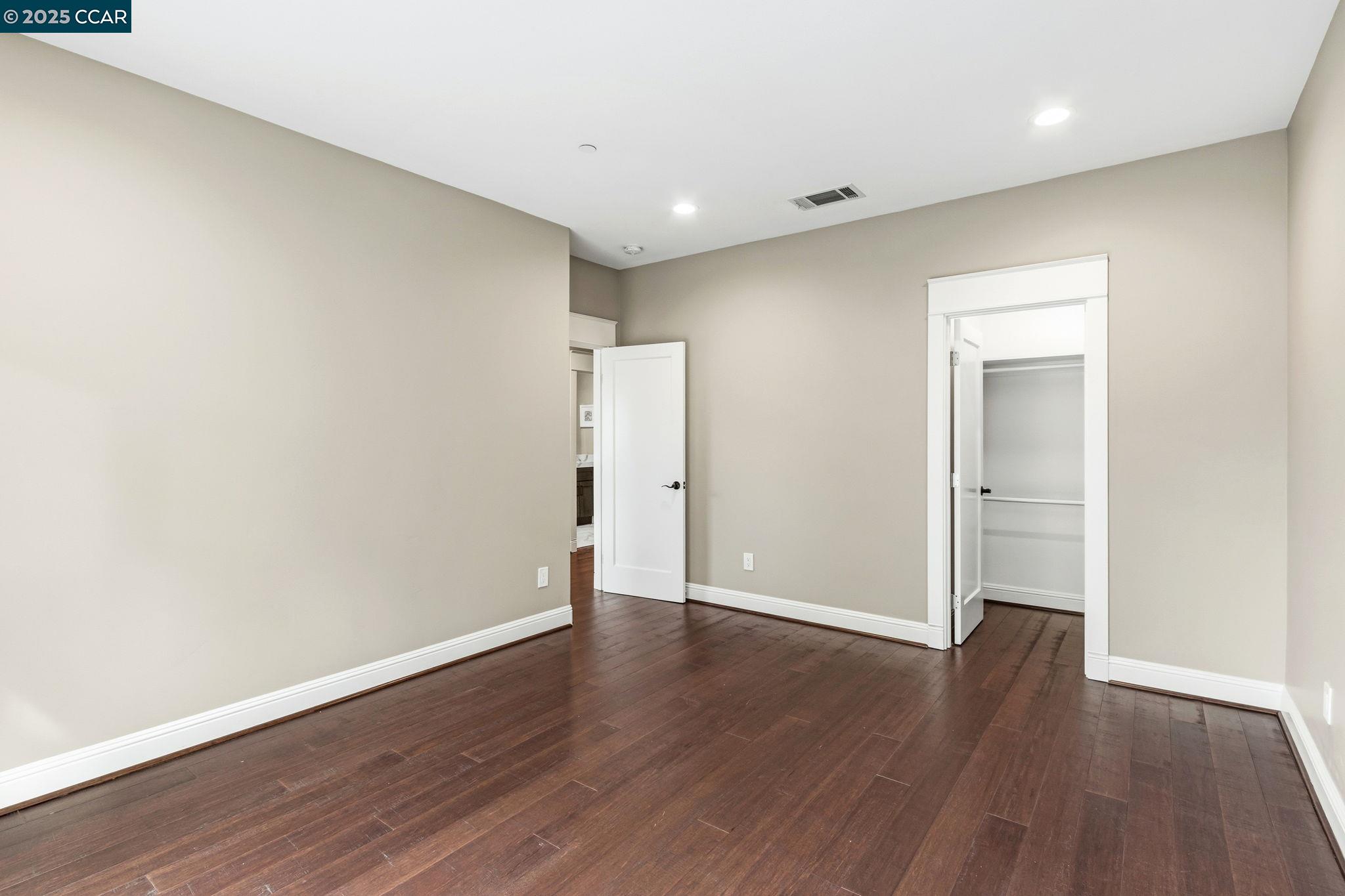 961 Oak View Circle Lafayette, CA 94549 - Photo 23 of 56 a view of an empty room with wooden floor