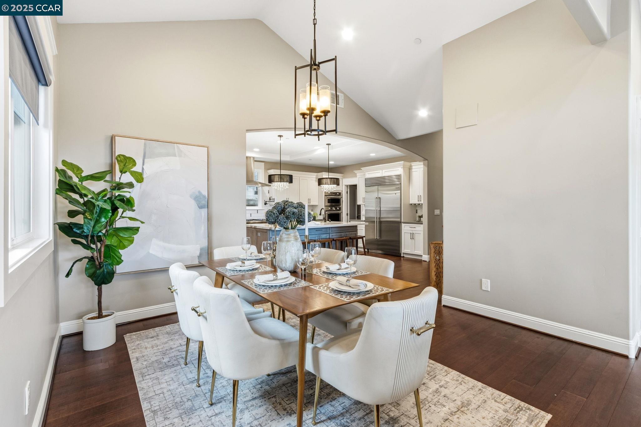 961 Oak View Circle Lafayette, CA 94549 - Photo 3 of 56 a dining room with furniture potted plants and wooden floor