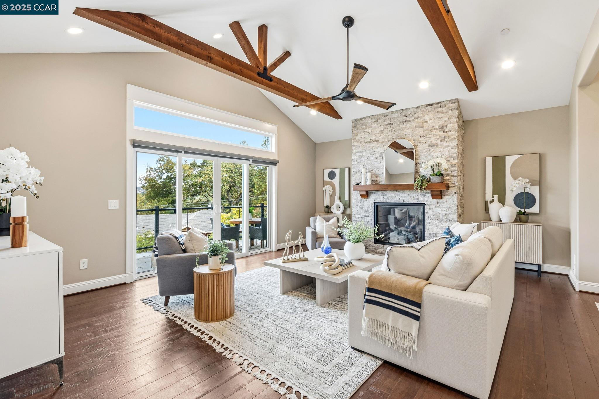 961 Oak View Circle Lafayette, CA 94549 - Photo 4 of 56 a living room with fireplace furniture and a large window