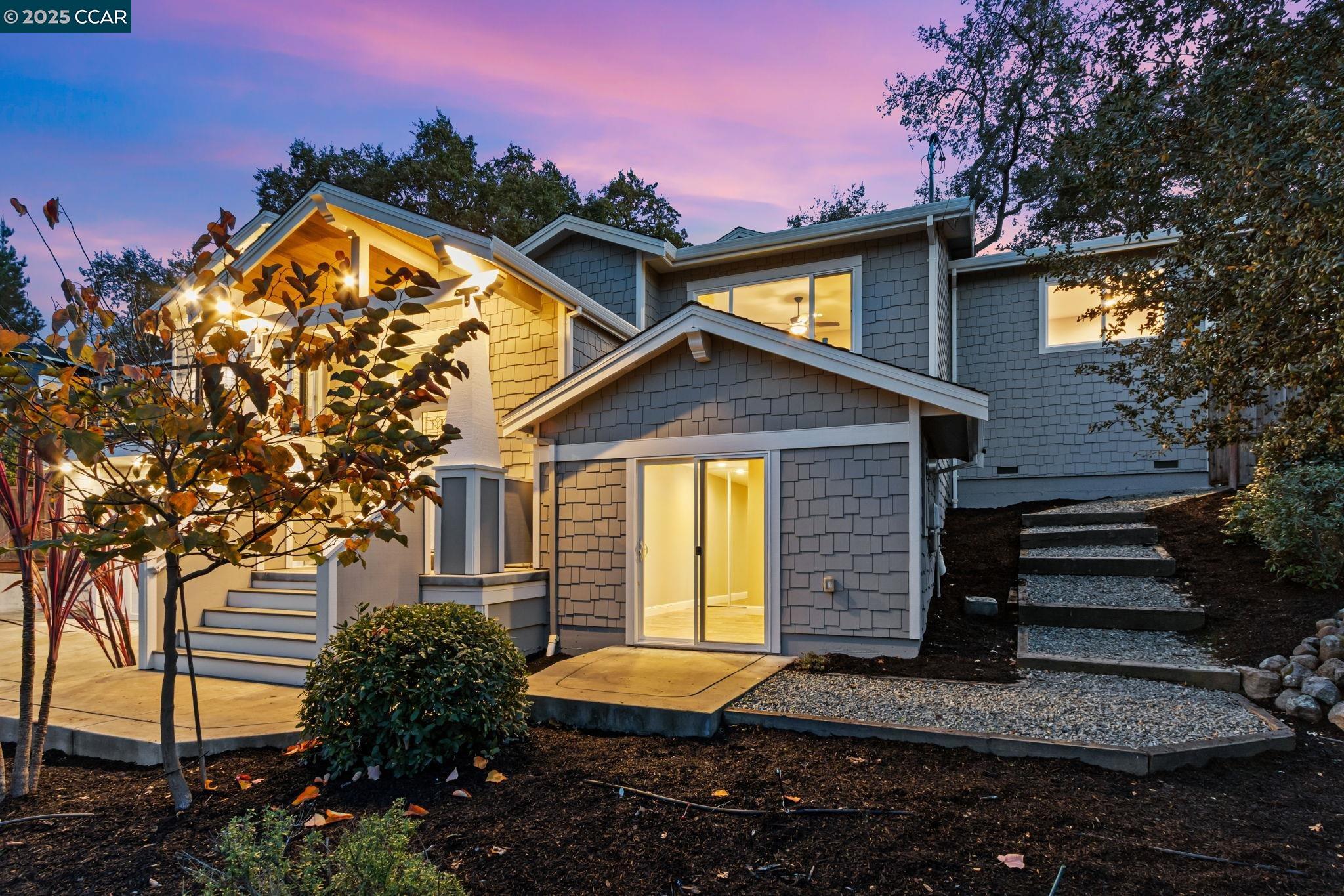 961 Oak View Circle Lafayette, CA 94549 - Photo 47 of 56 a view of a house with a yard and a tree