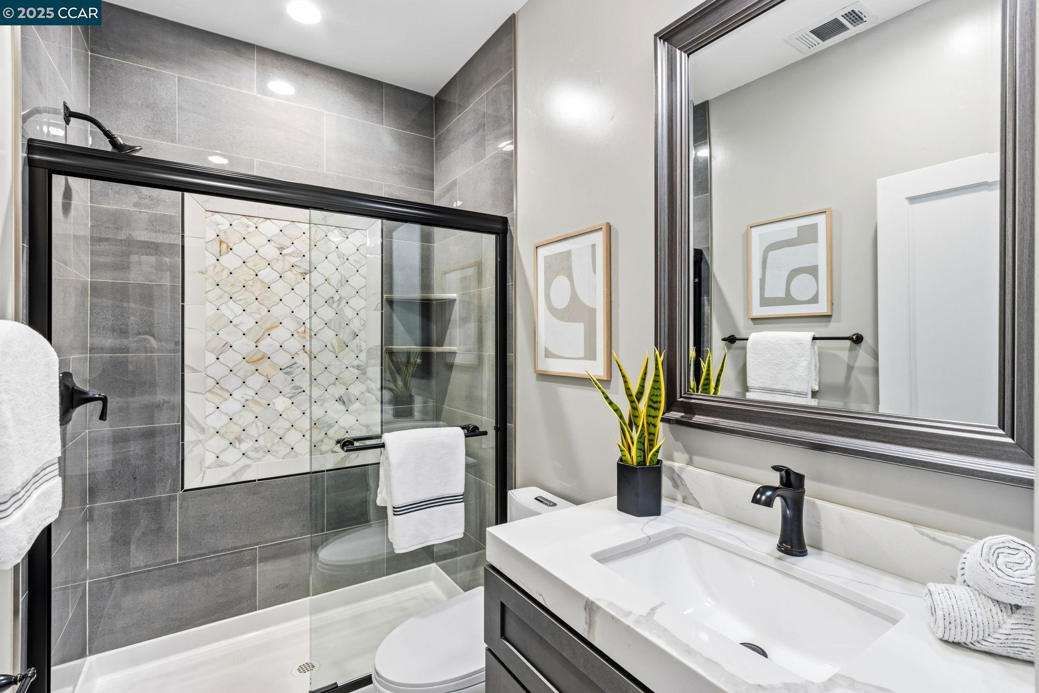 961 Oak View Circle Lafayette, CA 94549 - Photo 7 of 56 a bathroom with a sink and a mirror