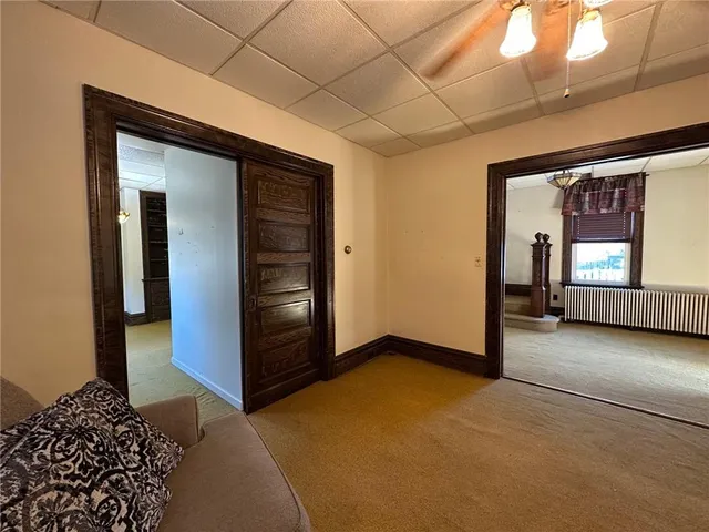 a view of livingroom with hallway and closet