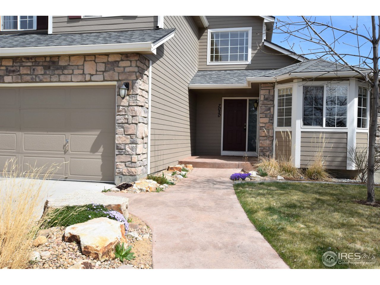 7050 Avondale Road Fort Collins, CO 80525 - Photo 2 of 33 Professionally landscaped
