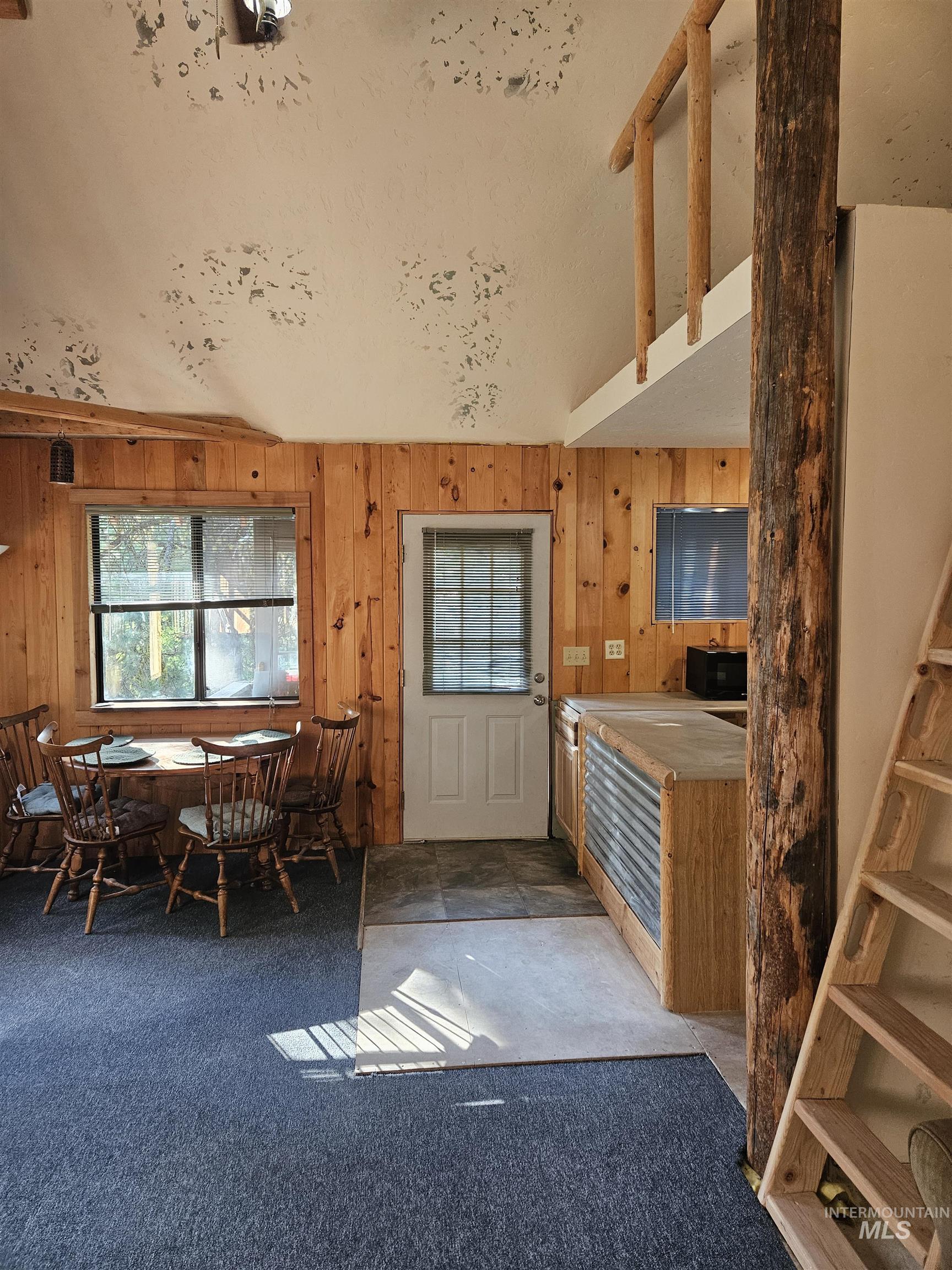 1510 Crown Point Parkway Cascade, ID 83611 - Photo 19 of 19 Carpeted dining room with lofted ceiling