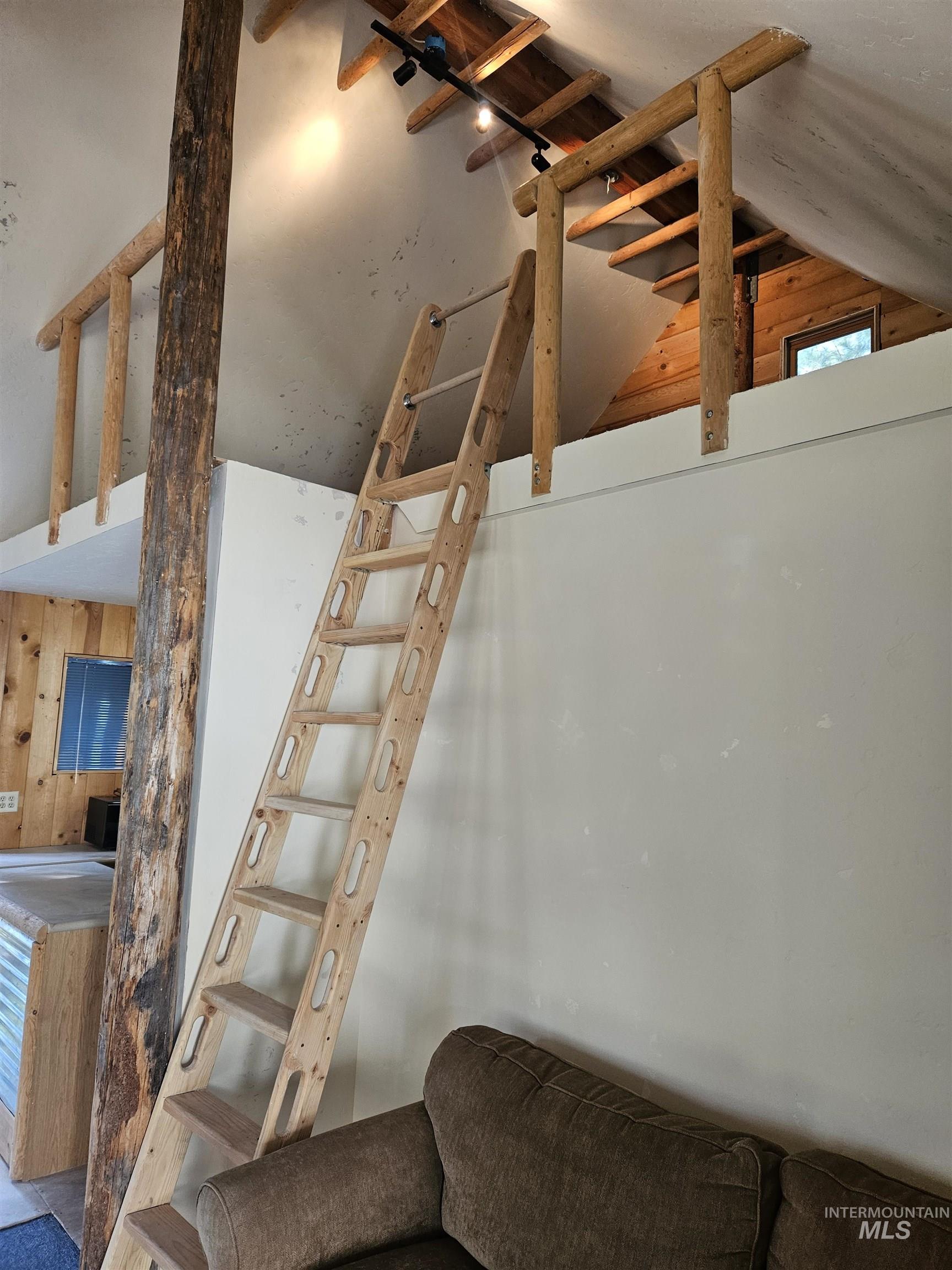 1510 Crown Point Parkway Cascade, ID 83611 - Photo 10 of 19 Stairs with vaulted ceiling