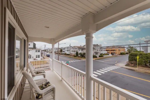 a view of a balcony with city view