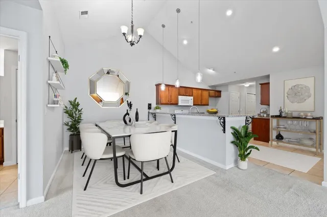 a view of a dining room with furniture
