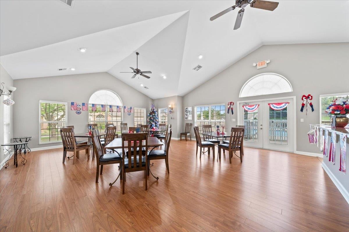 8897 Parkview Oaks Circle Olive Branch, MS 38654 - Photo 30 of 31 a view of a dining room with furniture window and wooden floor