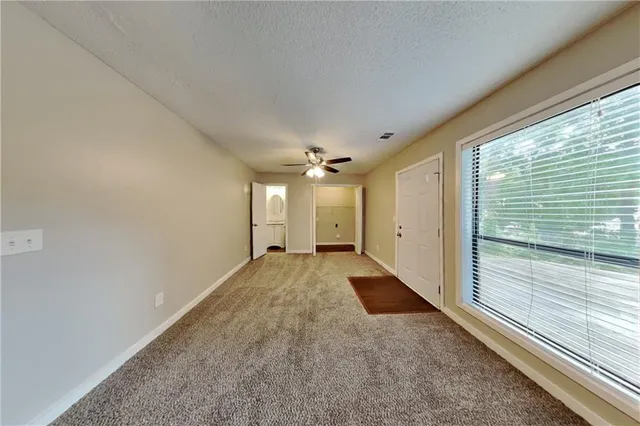 a view of a livingroom with a staircase