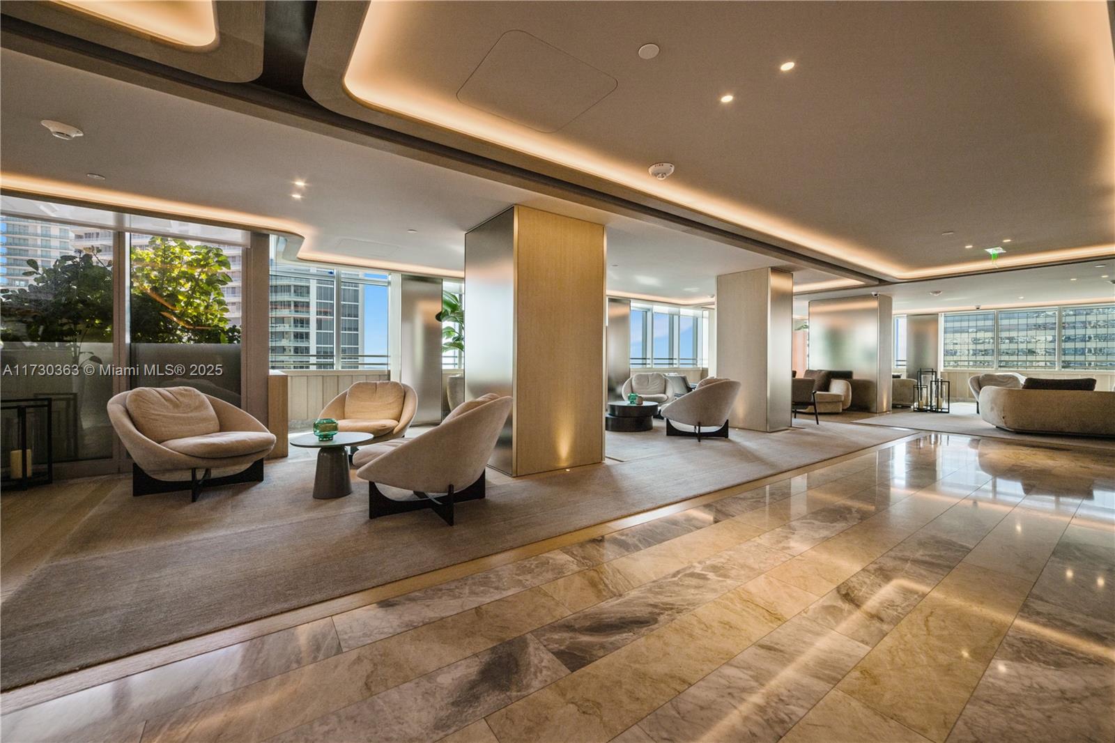 Brickell Miami, FL 33131 - Photo 4 of 19 a living room with furniture and a large window