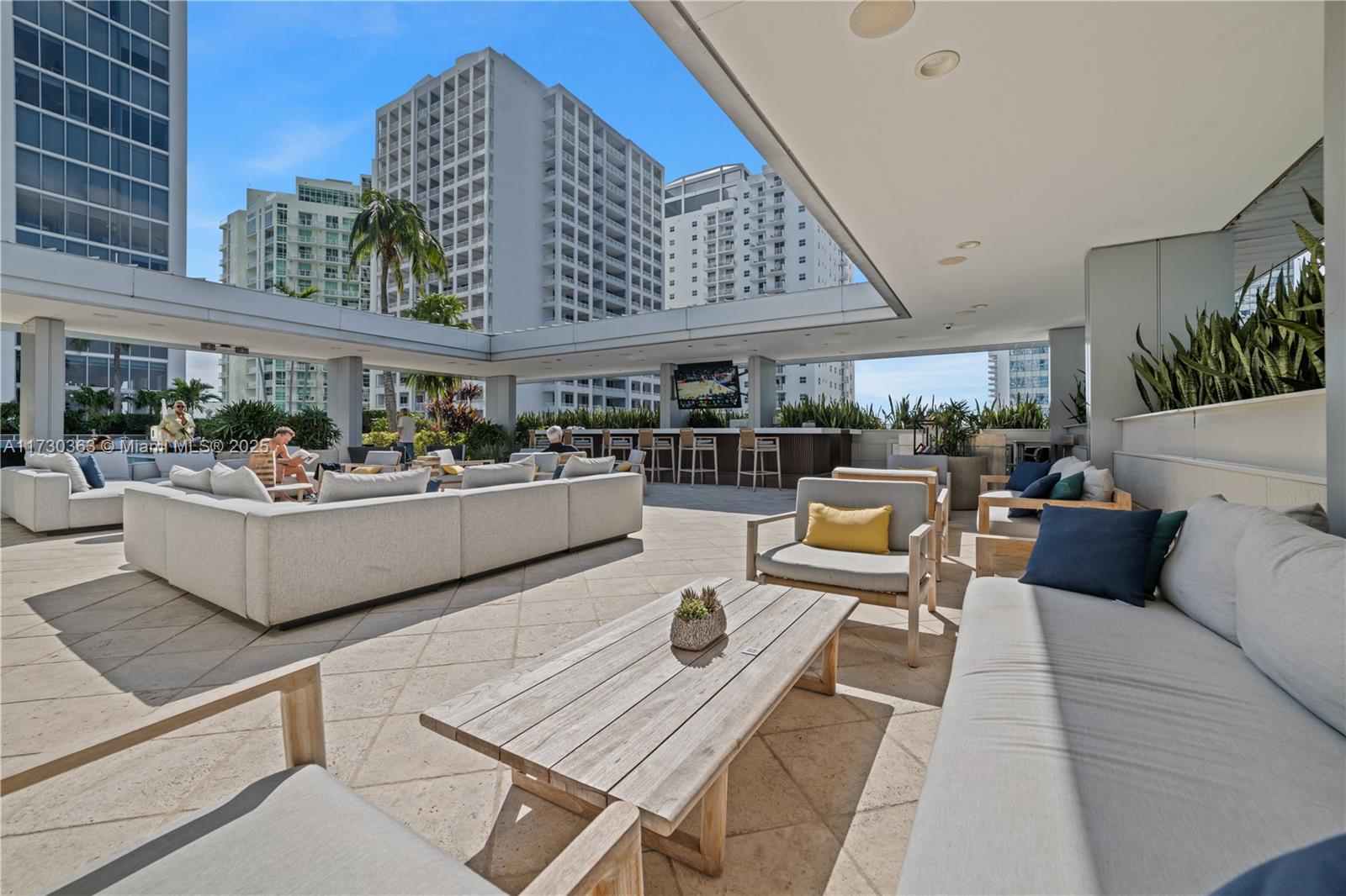 Brickell Miami, FL 33131 - Photo 8 of 19 a living room with furniture and wooden floor