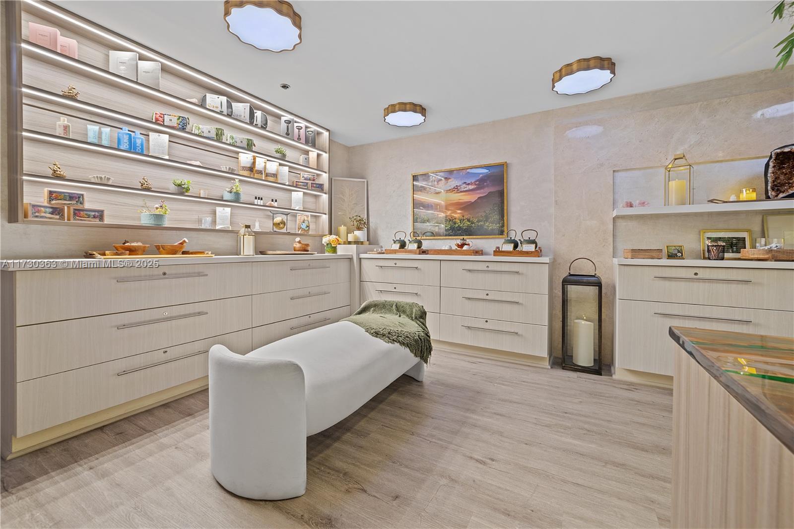 Brickell Miami, FL 33131 - Photo 9 of 19 a kitchen with a stove a sink and cabinets